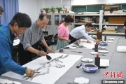 梦见抓鱼两岸艺术家在安徽“共绘一幅画”